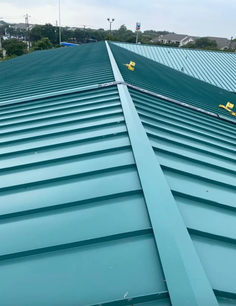 Green commercial metal roof ridge and valley for Metal Roof Repair in Portage Lakes