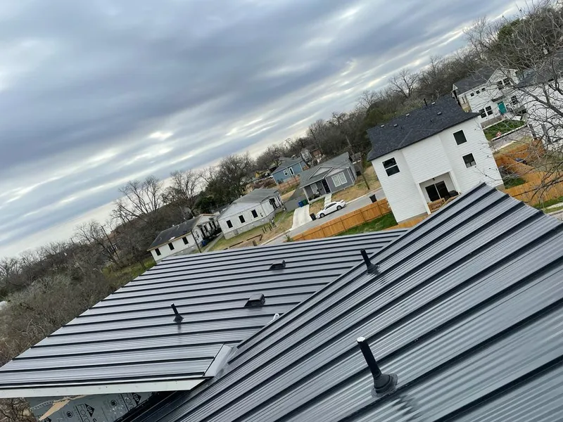 Standing seam metal roof panels with vents for Skylight Repair in Portage Lakes